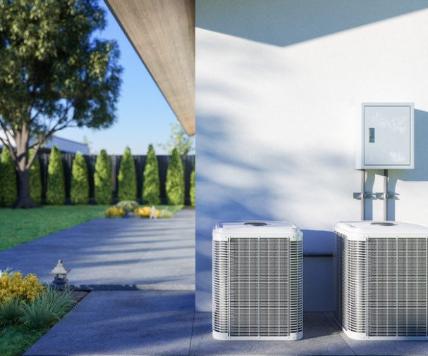 Close-up View Of Air Conditioning Outdoor Units In The Backyard